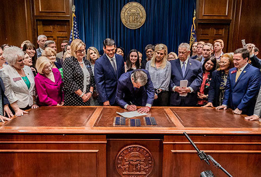 Georgia Gov. Brian Kemp signs the LIFE Act, making abortion illegal after a baby's heartbeat is detected, on May 7, 2019. (Photo/Governor's Office, File)