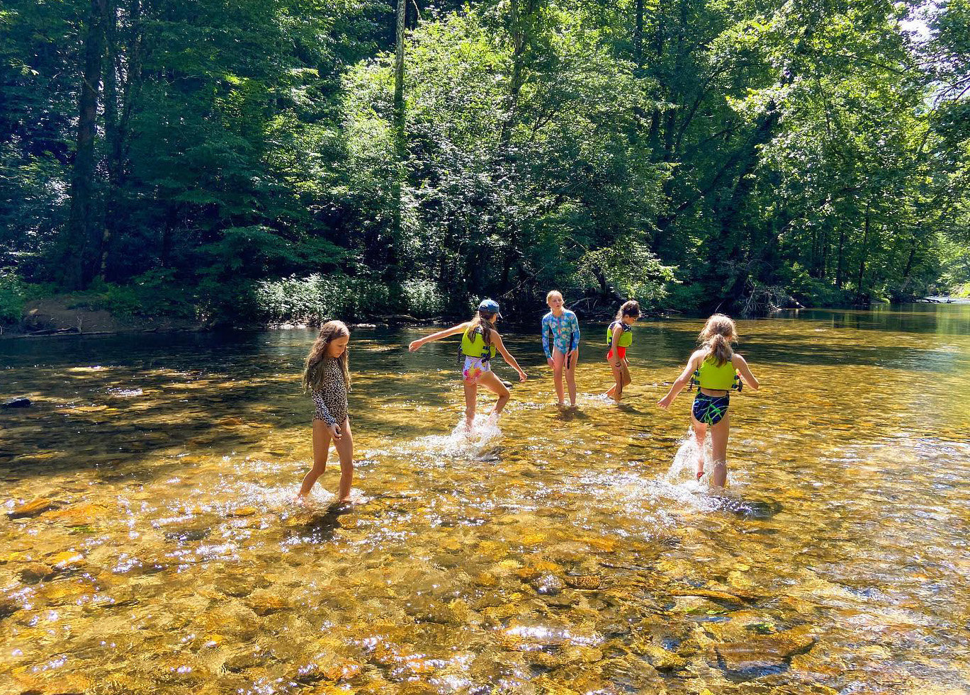 Campers play in a stream at Camp Pinnacle. (Photo/Georgia Baptist Mission Board)