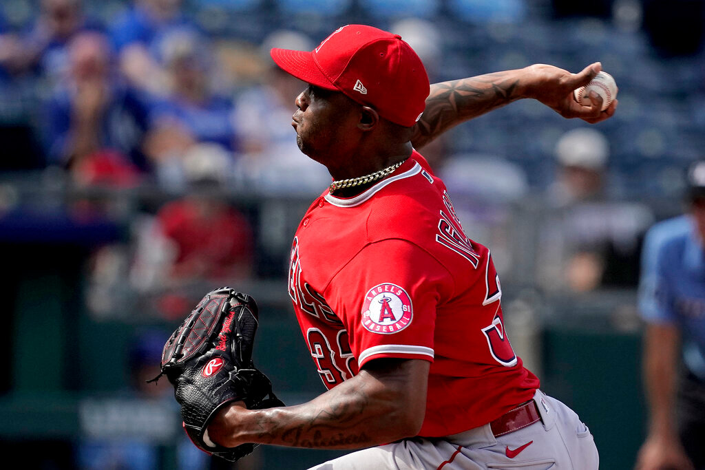 Los Angeles Angels relief pitcher Raisel Iglesias throws against the Kansas City Royals, Wednesday, July 27, 2022, in Kansas City, Mo. (AP Photo/Charlie Riedel)