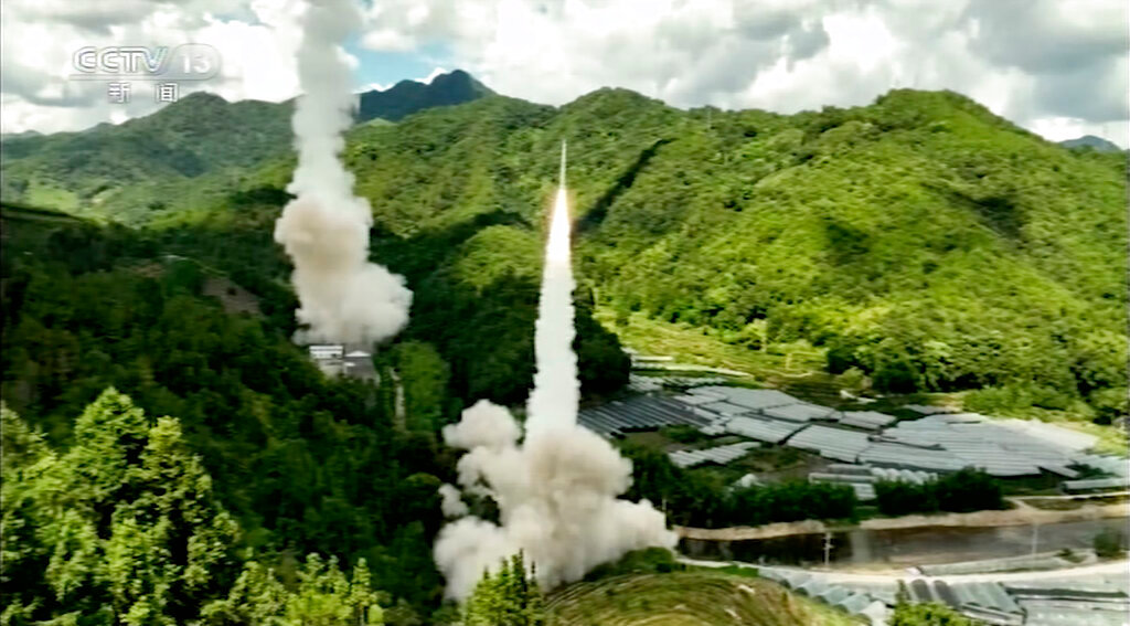 A projectile is launched from an unspecified location in China, Thursday, Aug. 4, 2022. (CCTV via AP)