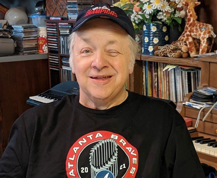 Ray Coleman poses for a photo after he was released from hospital in December 2021, following a stroke.
