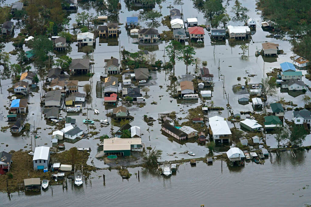 Floodwaters slowly recede in the aftermath of Hurricane Ida in Lafitte, La., Sept. 1, 2021. (AP Photo/Gerald Herbert, File)