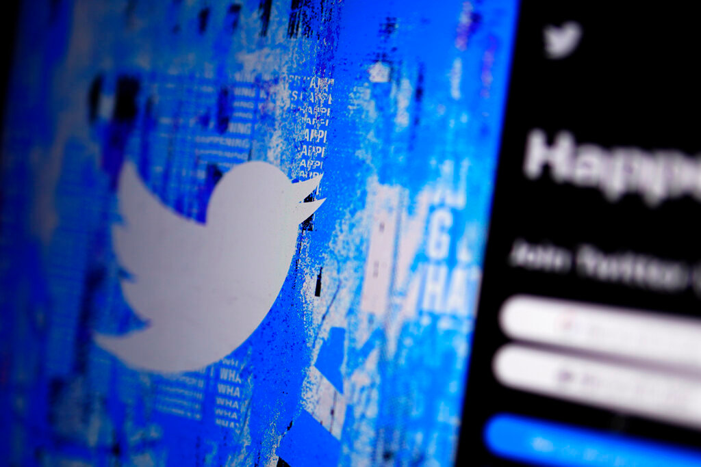 The Twitter splash page is displayed on a digital device in San Diego, April 25, 2022. (AP Photo/Gregory Bull, File)