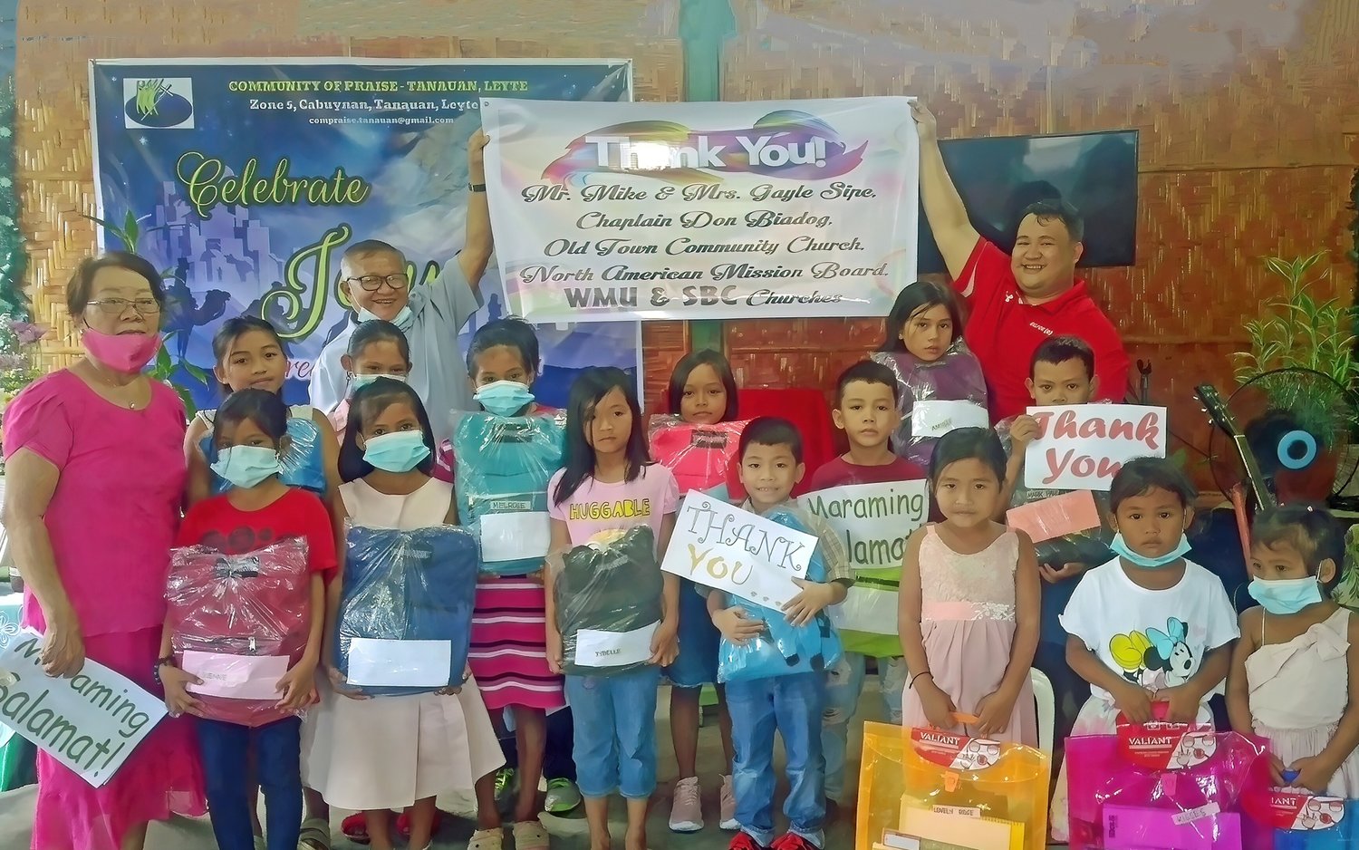 Children at the Tanauan Community Church in Leyte, Philippines, thank those who sent backpacks. (Submitted photo)