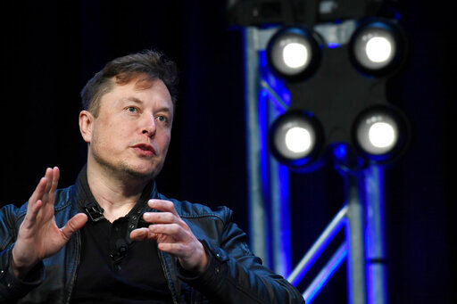 Tesla and SpaceX Chief Executive Officer Elon Musk speaks at a conference in Washington on March 9, 2020. (AP Photo/Susan Walsh, File)