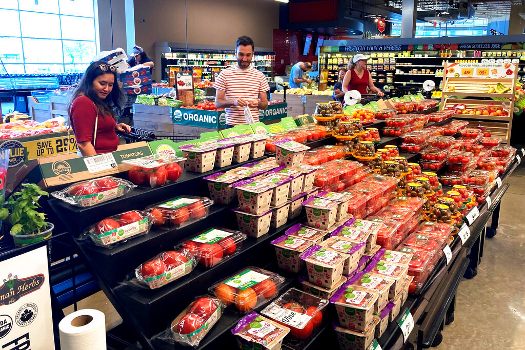 Shoppers shop at a grocery store in Glenview, Ill., July 4, 2022. (AP Photo/Nam Y. Huh, File)