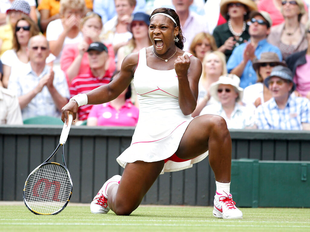 Serena Williams celebrates winning a point against Russia's Vera Zvonareva during their women's singles final July 3, 2010, at the All England Lawn Tennis Championships at Wimbledon. (AP Photo/Alastair Grant, File)