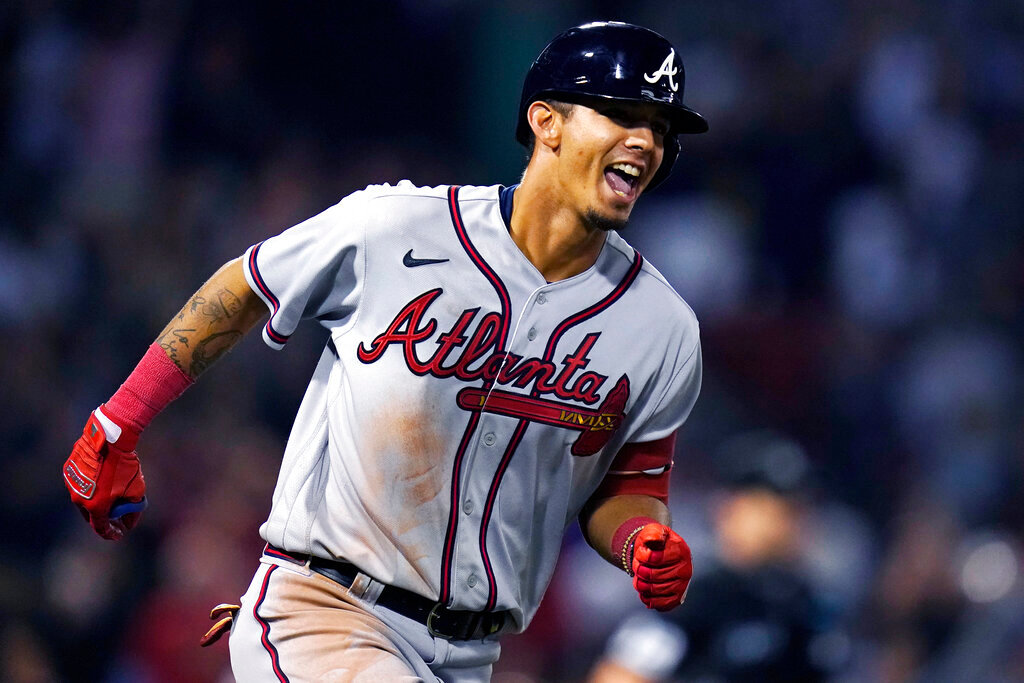 Atlanta Braves' Vaughn Grissom celebrates while running up the first base line on his two-run home run against the Boston Red Sox during the seventh inning Wednesday, Aug. 10, 2022, in Boston. (AP Photo/Charles Krupa)