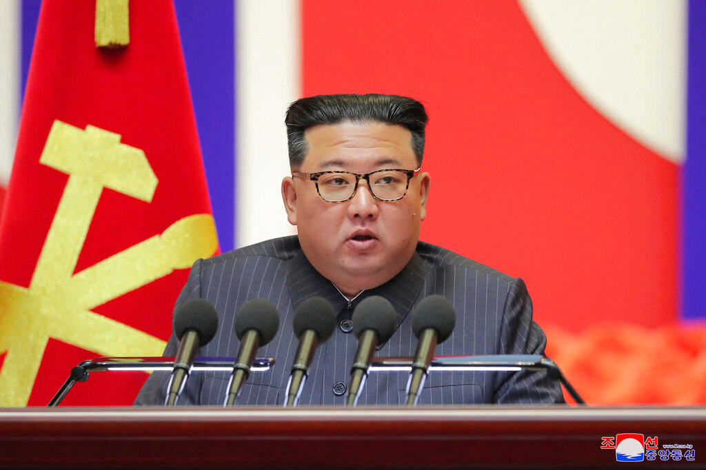 North Korean leader Kim Jong Un speaks during a "maximum emergency anti-epidemic campaign meeting" in Pyongyang, North Korea, Wednesday, Aug. 10, 2022. Kim has declared victory over COVID-19 and ordered an easing of preventive measures. (Korean Central News Agency/Korea News Service via AP)