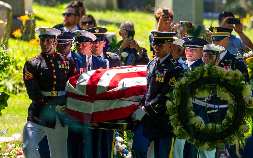 Pallbearers carry the coffin of late Congresswoman Jackie Walorski during her burial service at Southlawn Cemetery, Thursday, Aug. 11, 2022, in South Bend, Ind. (Chloe Trofatter/South Bend Tribune via AP)