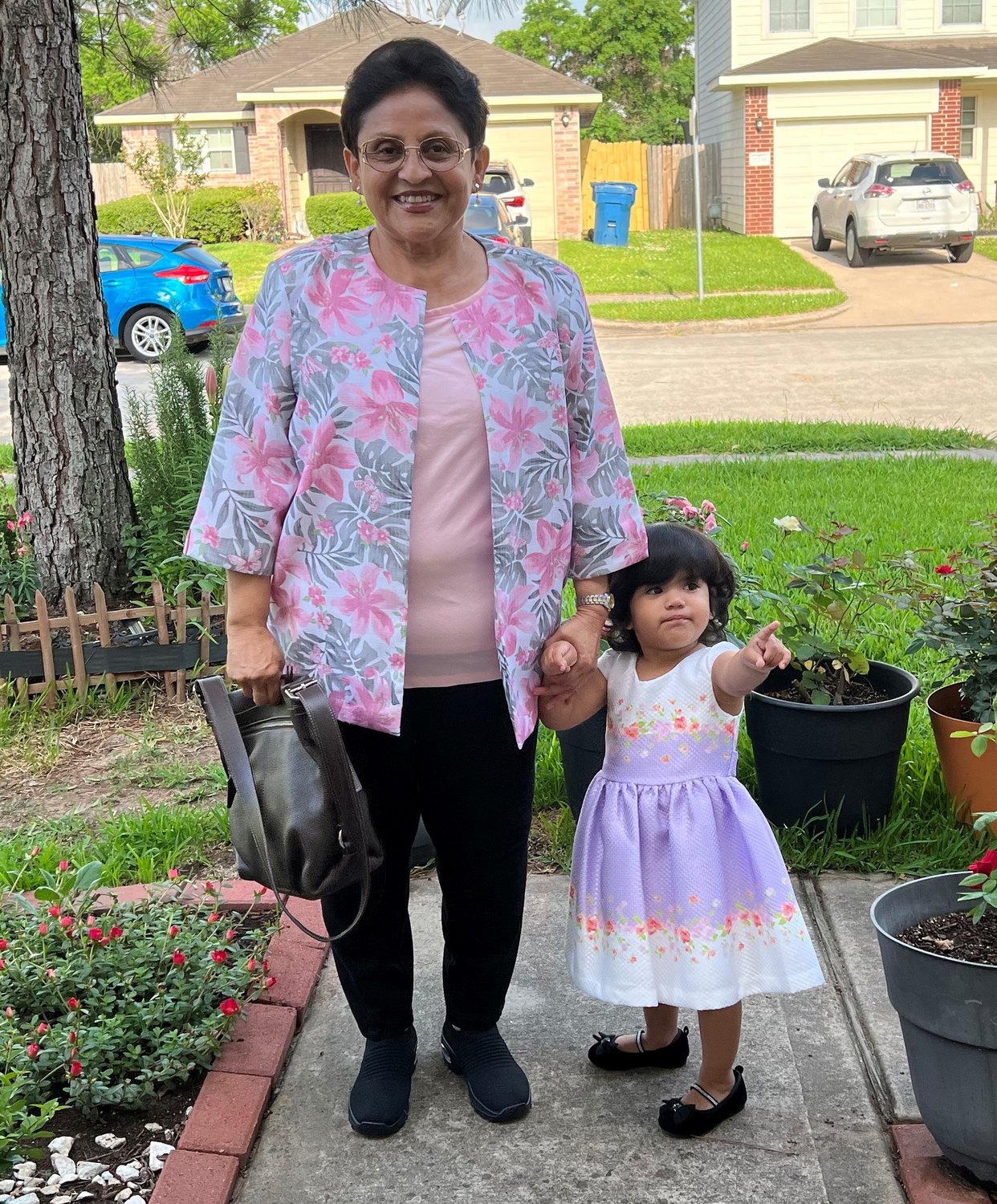 Fanny Baltanado, shown with her granddaughter, volunteered to help with Cross Community Church’s back-to-school ESL class for elementary students after taking an adult ESL class there.