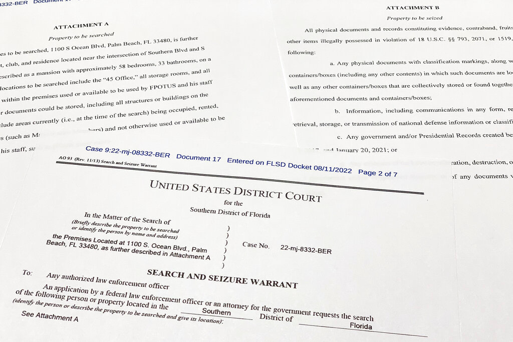 The FBI's unsealed search warrant for former President Donald Trump's Mar-a-Lago estate in Palm Beach, Fla., is photographed Friday, Aug. 12, 2022. (AP Photo/Jon Elswick)
