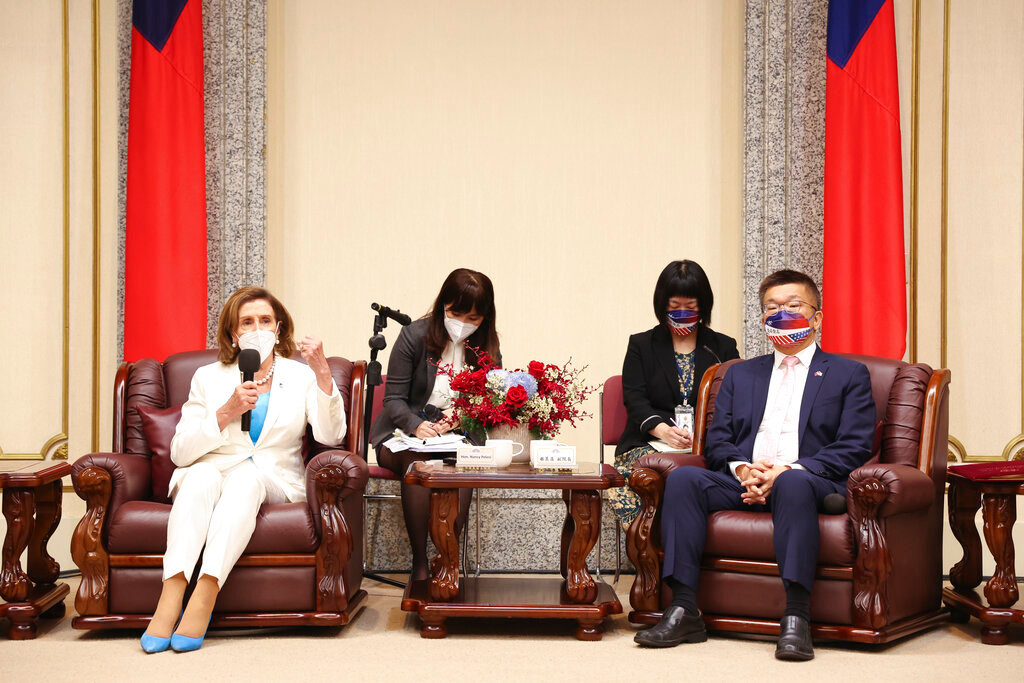 U.S. House Speaker Nancy Pelosi, left, speaks during a meeting with Legislative Yuan Deputy Speaker Tsai Chi-chang in Taipei, Taiwan, Aug. 3, 2022. (Taiwan Presidential Office via AP, File)