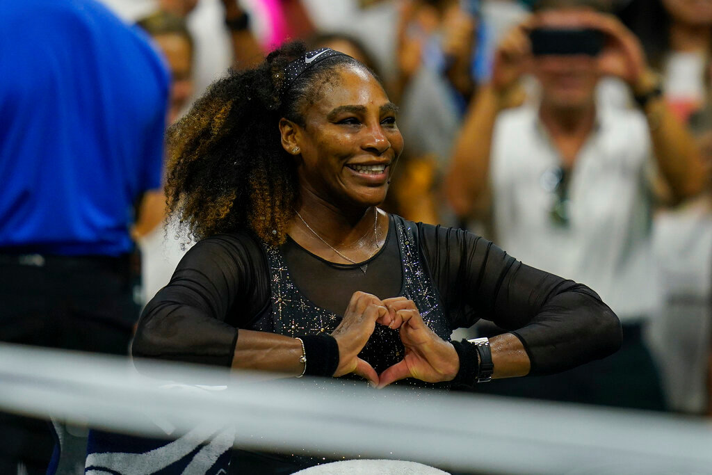 Serena Williams makes a heart with her hands after defeating Danka Kovinic, of Montenegro, in the first round of the US Open tennis championships Monday, Aug. 29, 2022, in New York. (AP Photo/Charles Krupa)