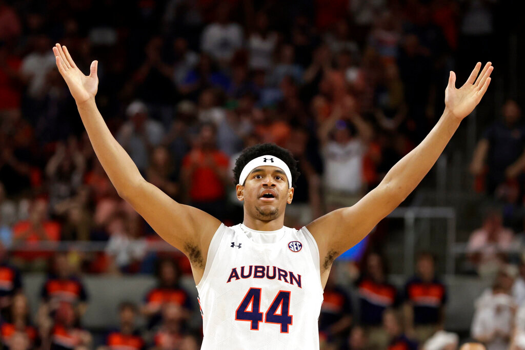 Auburn center Dylan Cardwell reacts after a score against South Carolina during the first half of an NCAA college basketball game Saturday, March 5, 2022, in Auburn, Ala. (AP Photo/Butch Dill)