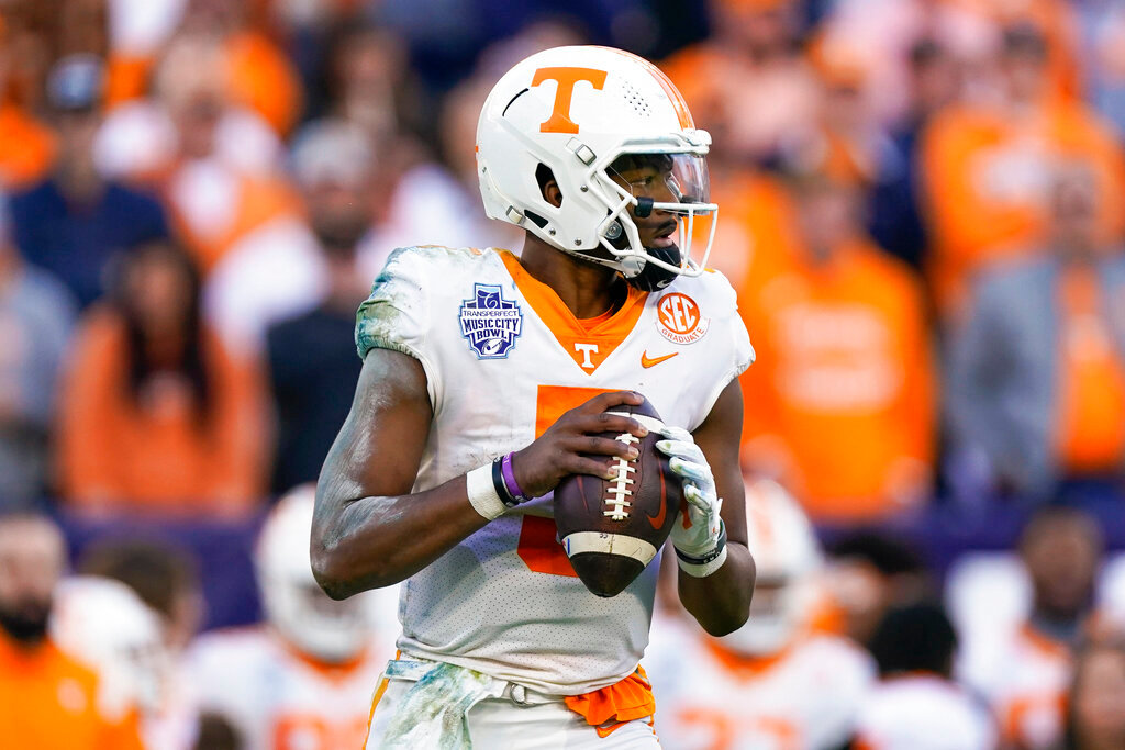 Tennessee quarterback Hendon Hooker plays against Purdue in the first half of the Music City Bowl on Dec. 30, 2021, in Nashville, Tenn. (AP Photo/Mark Humphrey, File)