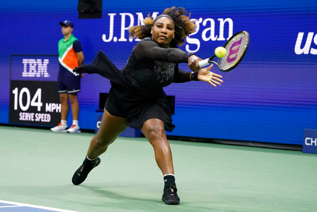 Serena Williams returns a shot to Anett Kontaveit, of Estonia, during the second round of the U.S. Open, Wednesday, Aug. 31, 2022, in New York. (AP Photo/John Minchillo)