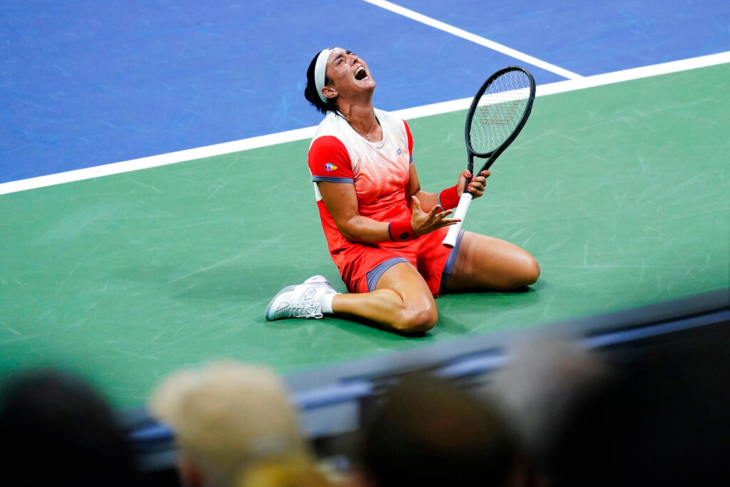 Ons Jabeur, of Tunisia, reacts after defeating Caroline Garcia, of France, in the semifinals of the U.S. Open championships on Thursday, Sept. 8, 2022, in New York. (AP Photo/Matt Rourke)