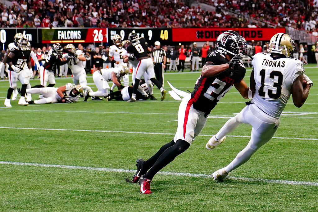 New Orleans Saints wide receiver Michael Thomas (13) makes a touchdown catch against the Atlanta Falcons during the second half Sunday, Sept. 11, 2022, in Atlanta. (AP Photo/Brynn Anderson)