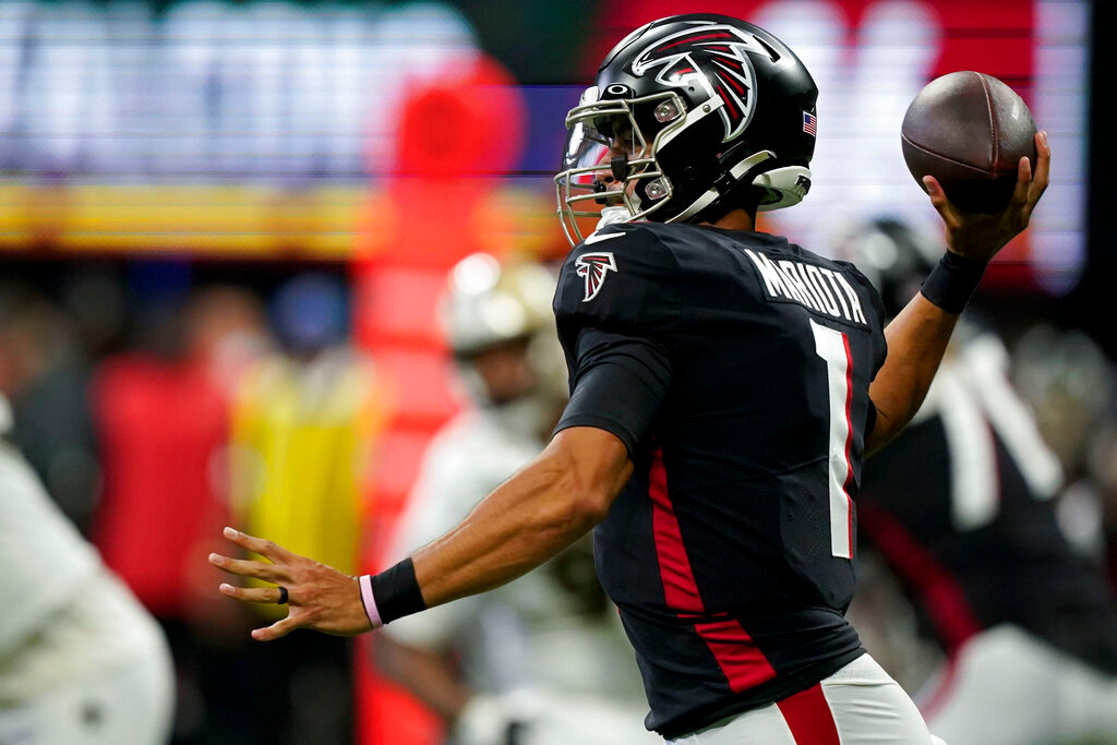 Atlanta Falcons quarterback Marcus Mariota (1) passes against the New Orleans Saints during the second half Sunday, Sept. 11, 2022, in Atlanta. (AP Photo/Brynn Anderson)