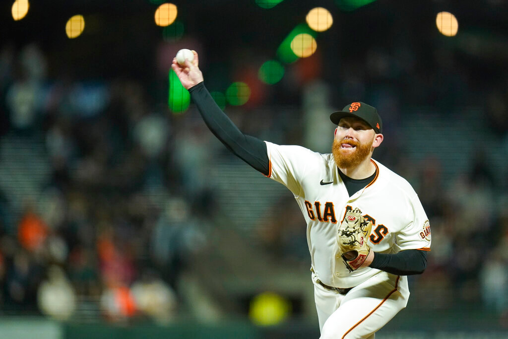 San Francisco Giants' Zack Littell pitches against the Atlanta Braves during the eighth inning in San Francisco, Monday, Sept. 12, 2022. (AP Photo/Godofredo A. Vásquez)
