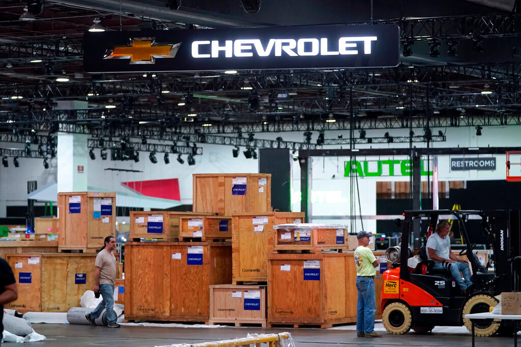 Workers set up for the North American International Auto Show in Detroit, Wednesday, Sept. 7, 2022. (AP Photo/Paul Sancya)