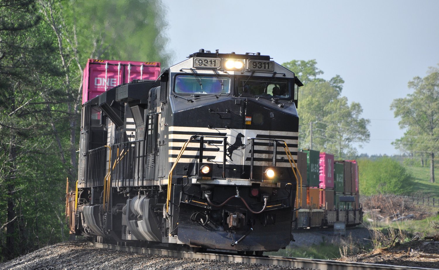 A Norfolk Southern freight train rolls through Braswell, Ga., April 17, 2019. (Christian Index/Henry Durand, File)
