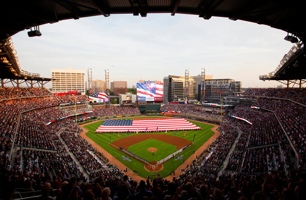 The national anthem is played before a baseball game between the Atlanta Braves and the San Diego Padres in Atlanta, April 14, 2017. (AP Photo/David Goldman, File)