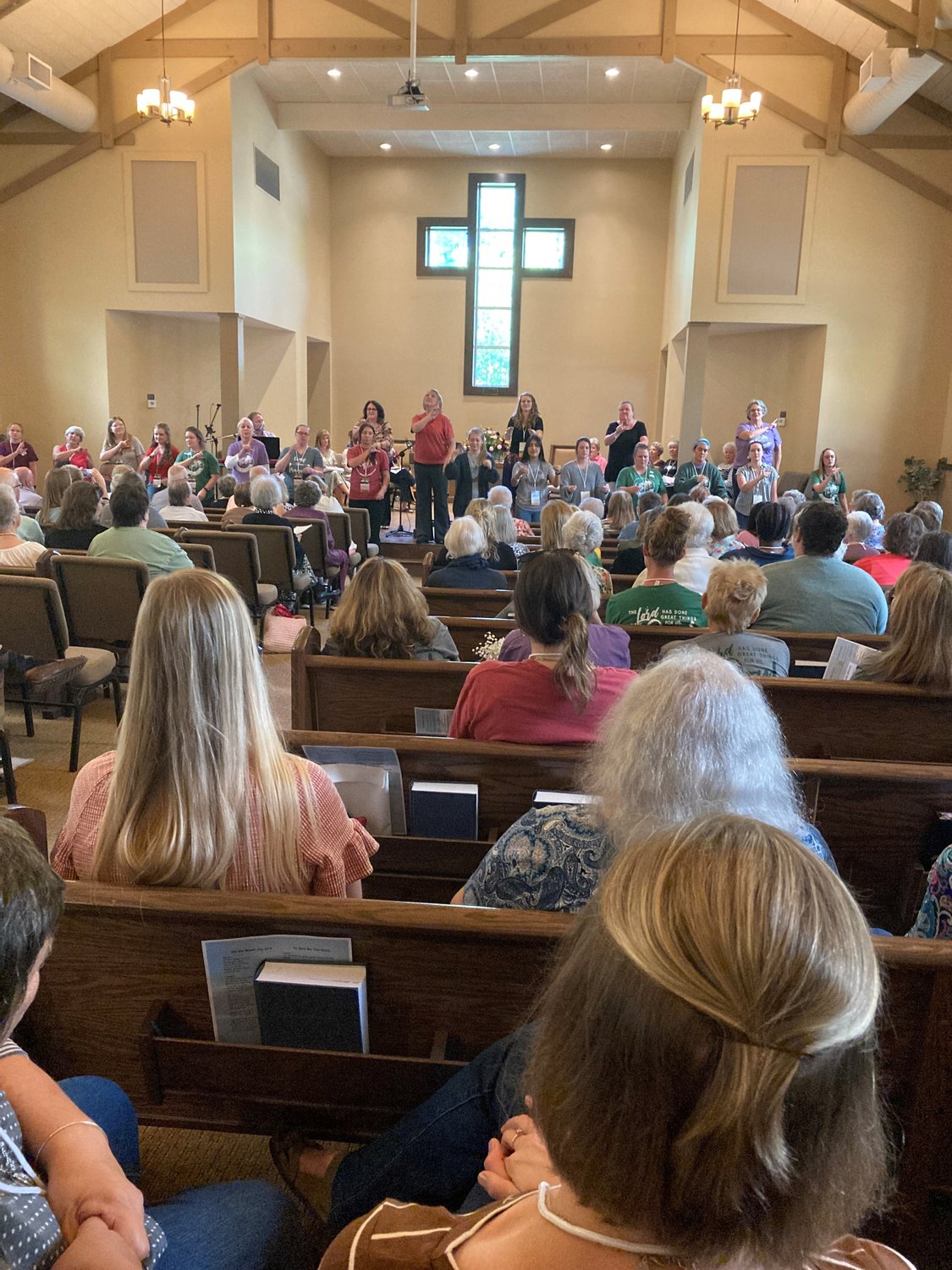 People worship in the chapel at Camp Pinnacle on Saturday, September 17, 2022.
