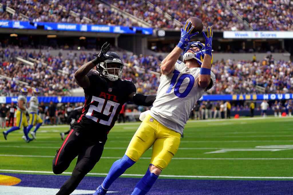 Los Angeles Rams wide receiver Cooper Kupp (10) makes a catch in the end zone for a touchdown during the first half as Atlanta Falcons cornerback Casey Hayward (29) defends, Sunday, Sept. 18, 2022, in Inglewood, Calif. (AP Photo/Mark J. Terrill)