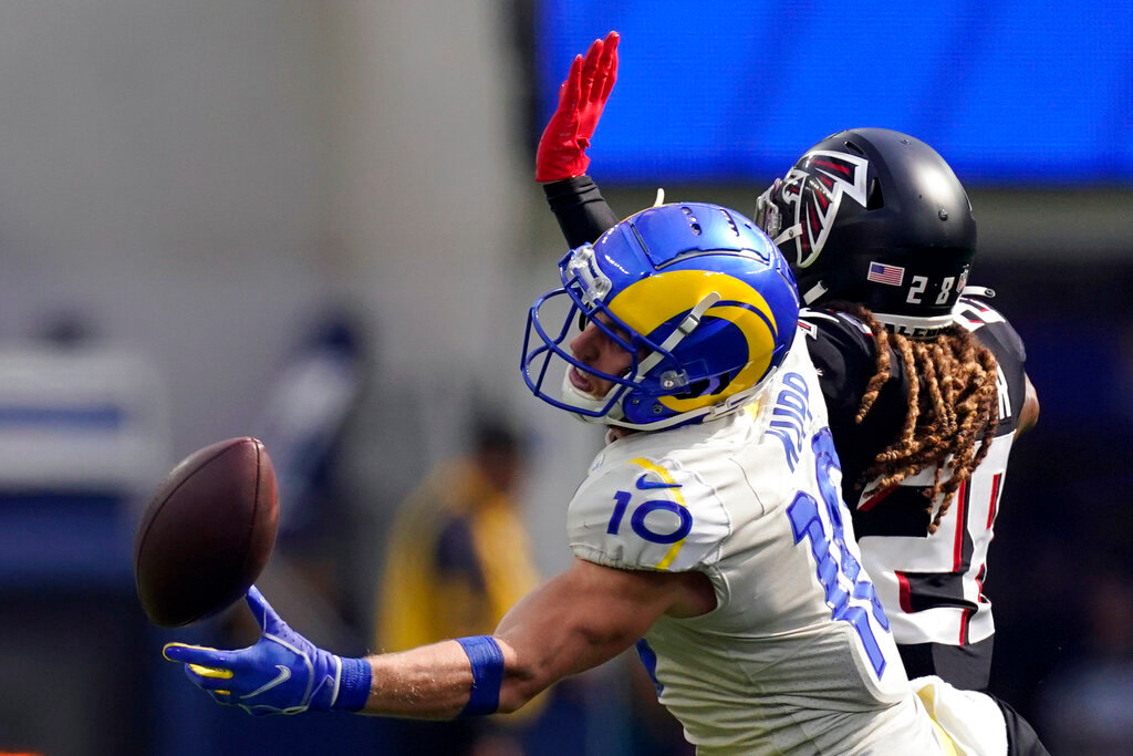 Los Angeles Rams wide receiver Cooper Kupp can't haul in a catch as Atlanta Falcons cornerback Mike Ford defends during the second half Sunday, Sept. 18, 2022, in Inglewood, Calif. (AP Photo/Mark J. Terrill)