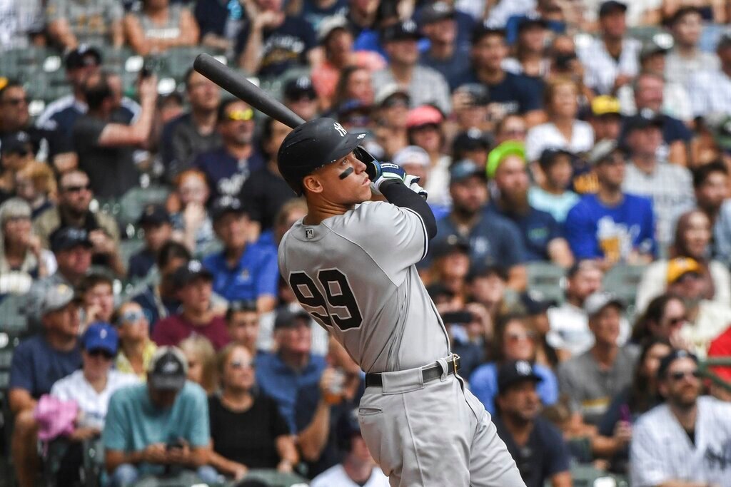 New York Yankees' Aaron Judge hits his 58th home run during the third inning against the Milwaukee Brewers, Sunday, Sept. 18, 2022, in Milwaukee. (AP Photo/Kenny Yoo)