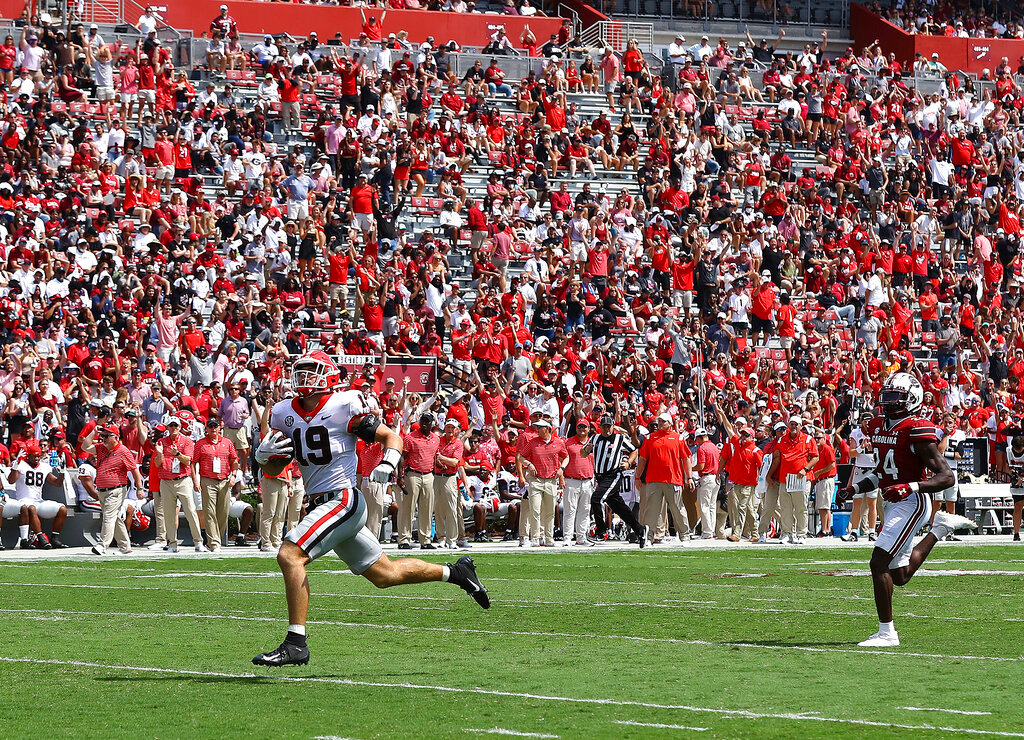 Georgia tight end Brock Bowers breaks away for a 70-plus yard touchdown against South Carolina during the third quarter Saturday, Sept. 17, 2022, in Columbia, S.C. (Curtis Compton/Atlanta Journal-Constitution via AP)