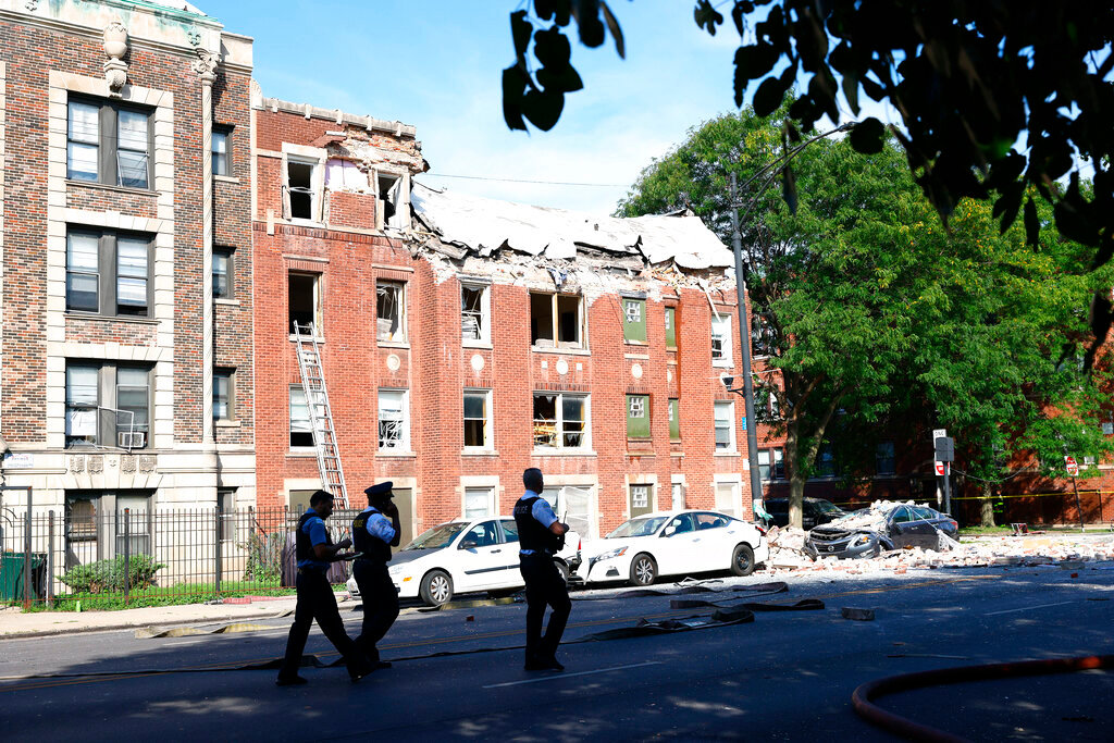 Fire crews respond to the scene of an explosion at a building on Tuesday, Sept. 20, 2022, in Chicago. (Anthony Vazquez/Chicago Sun-Times via AP)
