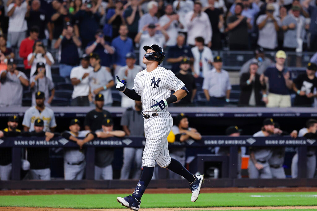 New York Yankees' Aaron Judge heads for home after hitting his 60th home run of the season, during the ninth inning against the Pittsburgh Pirates on Tuesday, Sept. 20, 2022, in New York. (AP Photo/Jessie Alcheh)