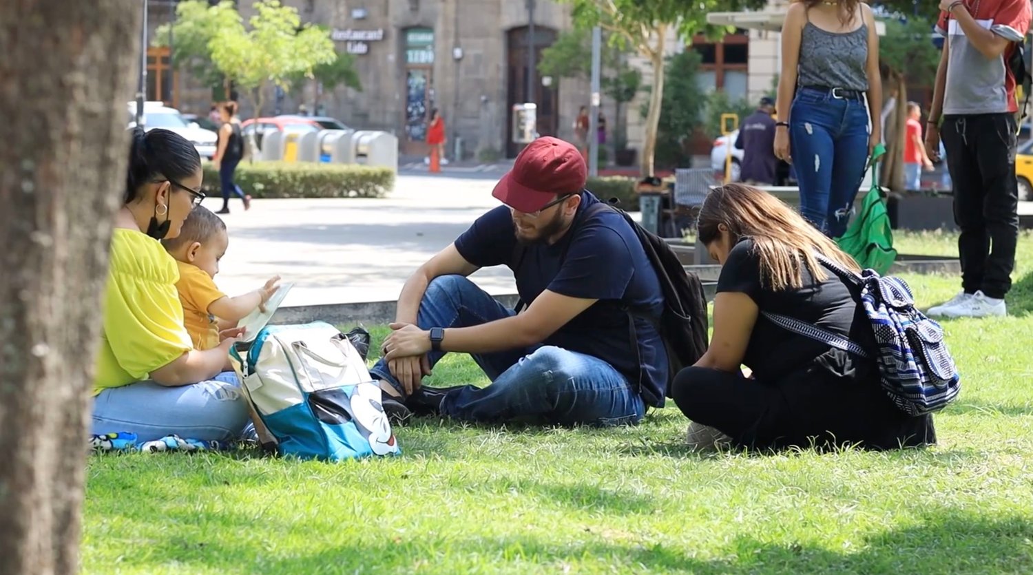Danny and Desiree Buitrago share Christ with a woman in a downtown park during a GoIMPACT mission trip to Guadalajara, Jalisco, Mexico. (Photo/International Mission Board)