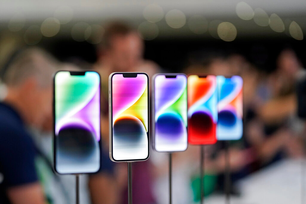 New iPhone 14 models on display at an Apple event on the campus of Apple's headquarters in Cupertino, Calif., Sept. 7, 2022. (AP Photo/Jeff Chiu, File)