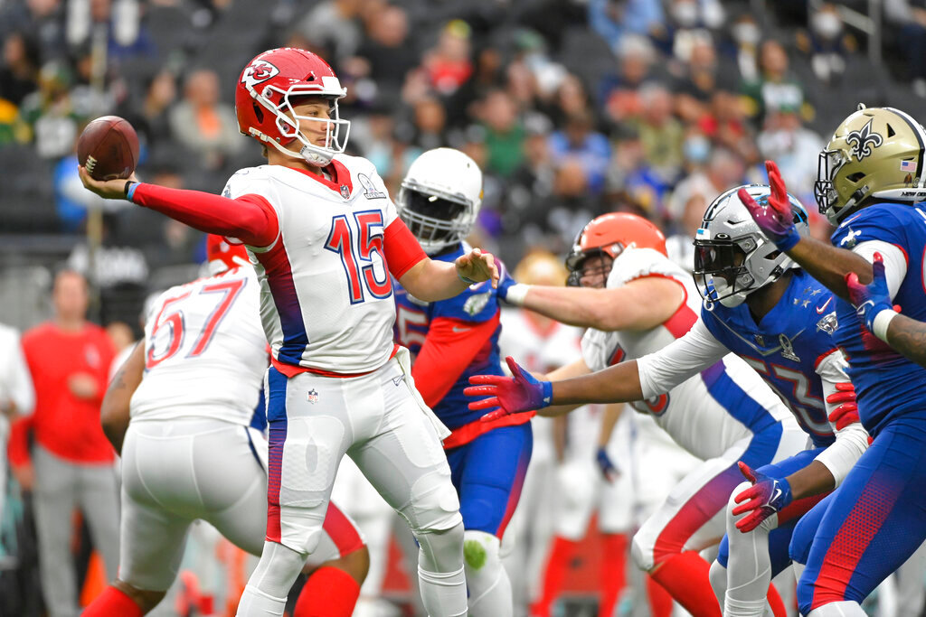 AFC quarterback Patrick Mahomes (15) of the Kansas City Chiefs passes against the NFC during the first half of the Pro Bowl, Sunday, Feb. 6, 2022, in Las Vegas. (AP Photo/David Becker, File )