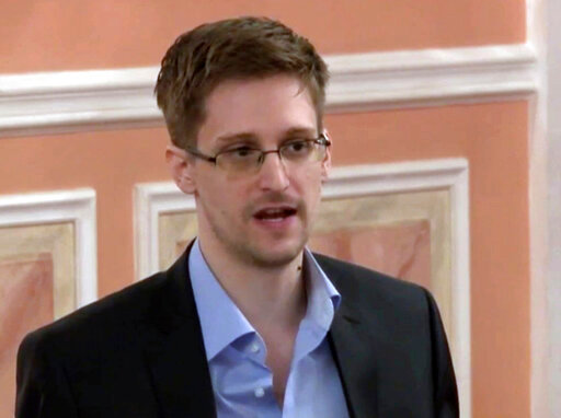 Former National Security Agency systems analyst Edward Snowden speaks in Moscow, Oct. 11, 2013. (AP Photo, File)