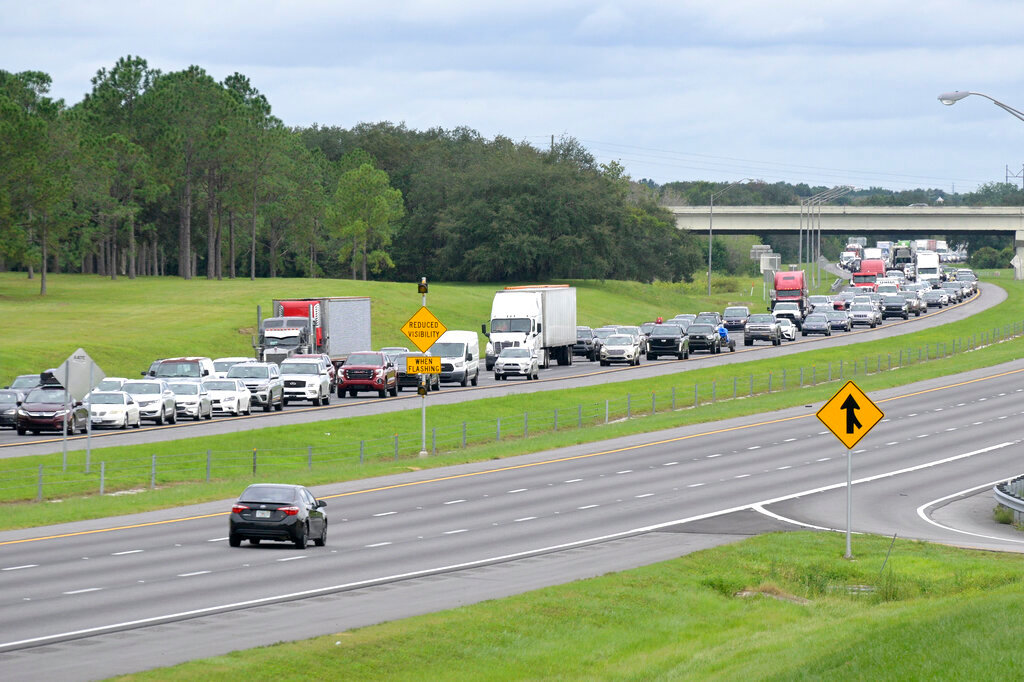 Eastbound traffic crowds Interstate 4 as people evacuate as Hurricane Ian approaches the western side of the state, Tuesday, Sept. 27, 2022, in Lake Alfred, Fla. (AP Photo/Phelan M. Ebenhack)