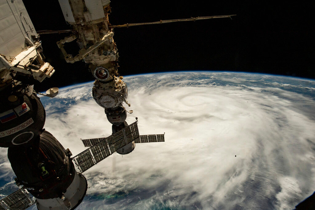 This Satellite image provided by NASA on Sept. 26, 2022, shows Hurricane Ian pictured from the International Space Station just south of Cuba gaining strength and heading toward Florida. (NASA via AP)