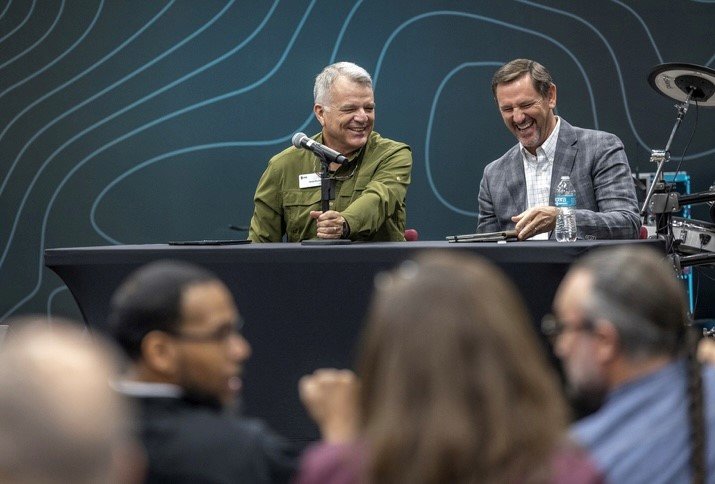 Chuck Pourciau, chairman of IMB’s board of trustees, shares a laugh with President Paul Chitwood during this week's meeting in Richmond, Va.