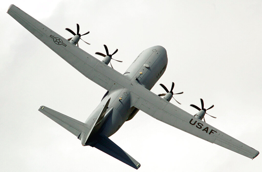 A US Air Force Lockheed Martin-made C-130J Super Hercules performs a demonstration flight at Le Bourget, north of Paris, in June 2009. (AP Photo/Remy de la Mauviniere, File)