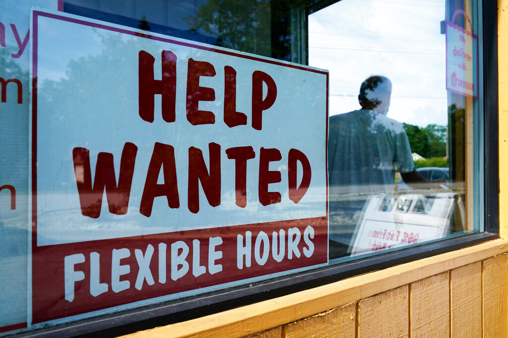 A help wanted sign is displayed in Deerfield, Ill., Wednesday, Sept. 21, 2022. (AP Photo/Nam Y. Huh)