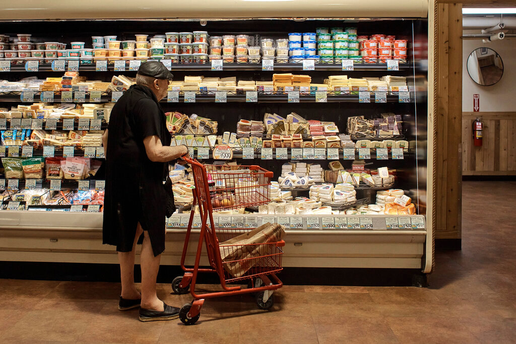 A man shops at a supermarket on July 27, 2022, in New York. (AP Photo/Andres Kudacki, File)