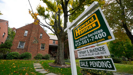 A sign shows a home in Mount Lebanon, Pa., is under contract, Oct. 17, 2022. (AP Photo/Gene J. Puskar, file)