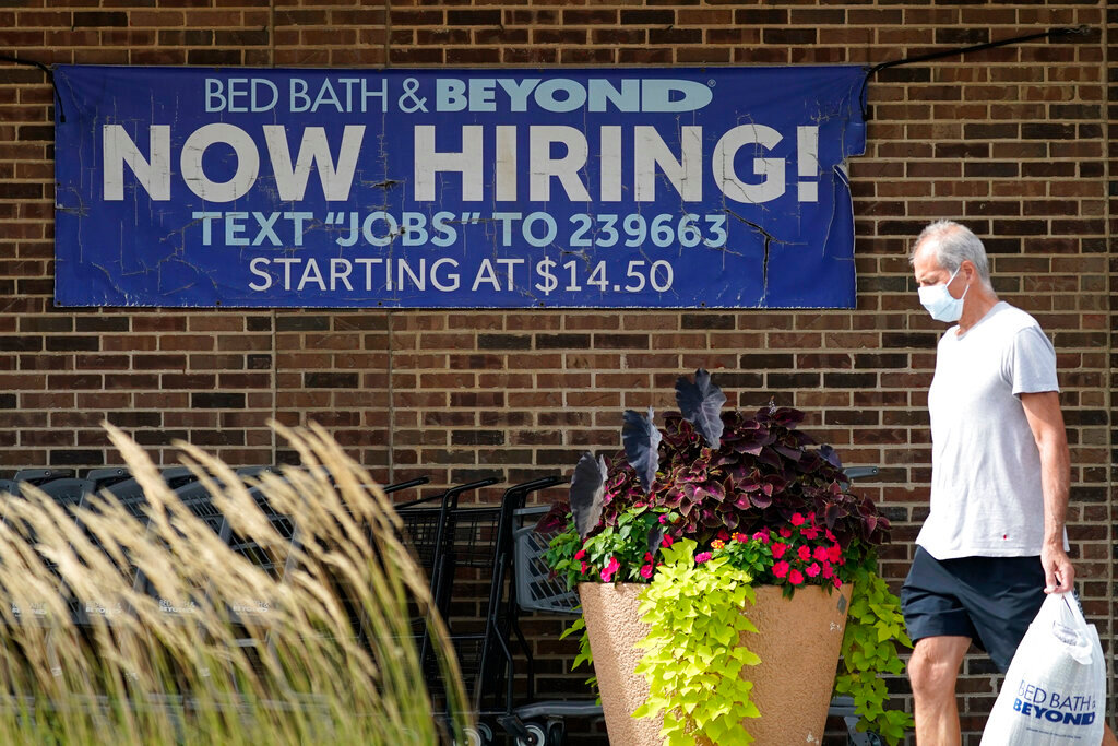 A hiring sign is displayed in Deerfield, Ill., Wednesday, Sept. 21, 2022. (AP Photo/Nam Y. Huh, File)