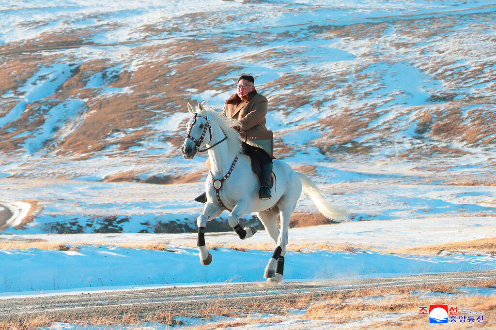 North Korean leader Kim Jong Un rides a white horse to climb Mount Paektu, North Korea. Russia recently sent North Korean leader Kim Jong Un a trainload of 30 thoroughbred horses, opening the border with its neighbor for the first time in 2 1/2 years. (Korean Central News Agency/Korea News Service via AP, File)