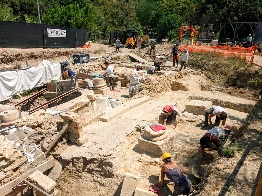 Archaeologists work at the site of the discovery of two dozen well-preserved bronze statues from an ancient Tuscan thermal spring in San Casciano dei Bagni, central Italy. (Italian Culture Ministry via AP)