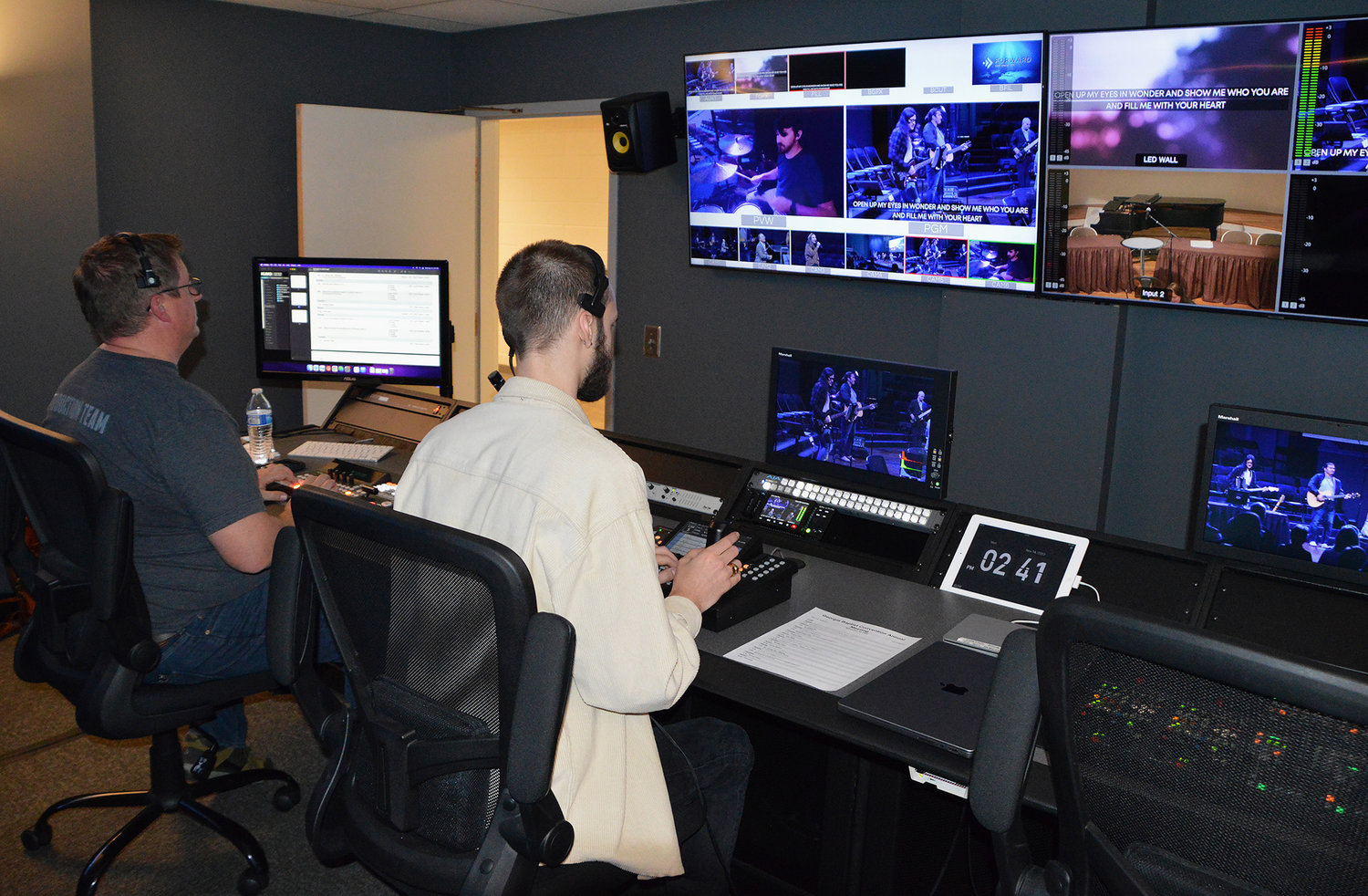 Jonathan Lawhon, left, and Ezra Elliott work the video master control room during the 200th annual meeting of the Georgia Baptist Convention at Warren Baptist Church in Augusta, Ga. Monday, Nov. 14, 2022. (The Index/Henry Durand)